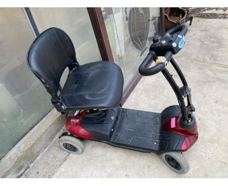 AN EDEN MOBILITY SCOOTER COMPLETE WITH KEY, CHARGER AND BATTERY IN THE OFFICE