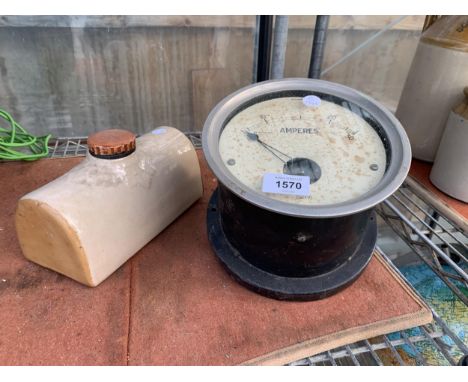 A VINTAGE ELLIOTT AMPRES METRE AND A STONEWARE HOT WATER BOTTLE