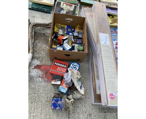 A LARGE ASSORTMENT OF VINTAGE CAR SPARES TO INCLUDE BRAKE SHOES, BEARINGS AND SWITCHES ETC