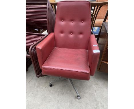 A RED FAUX LEATHER SWIVEL DESK CHAIR ON ALLOY BASE WITH BUTTON BACK