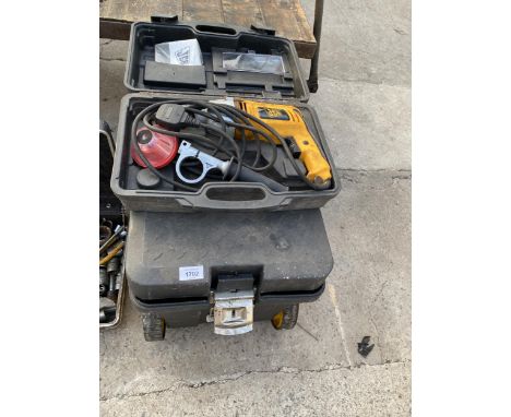 A STANLEY TROLLEY TOOL BOX AND A JCB ELECTRIC DRILL WITH CARRY CASE