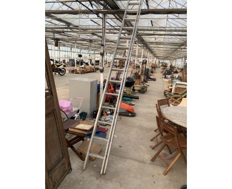A THIRTY RUNG ALUMINIUM TWO SECTION EXTENDING LADDER