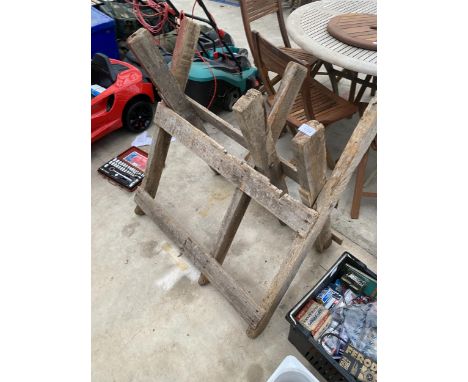 A VINTAGE WOODEN SAW HORSE