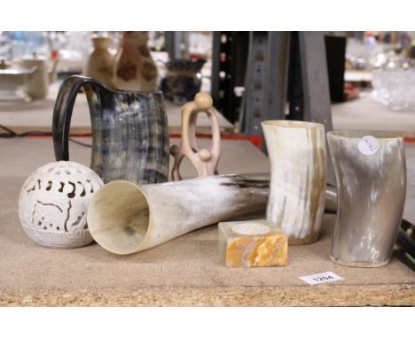 TWO NORSE VIKING DRINKING HORNS TOGETHER WITH A MUG, ETC., CARVED SOAPSTONE TEA LIGHT CANDLE HOLDER, ETC.,