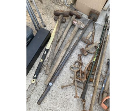 FOUR SLEDGE HAMMERS AND A HEAVY DUTY TAMPING BLOCK