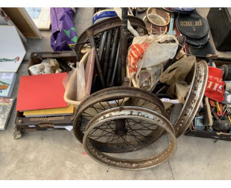 A LARGE COLLECTION OF VINTAGE MOTORBIKE ITEMS TO INCLUDE WHEELS, MUD GUARDS AND MANUALS ETC
