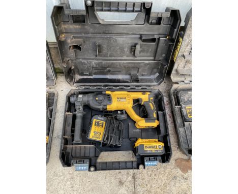 A DEWALT CORDLESS SDS DRILL WITH BATTERY AND CHARGER