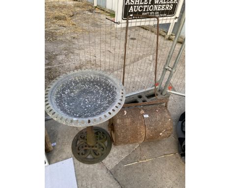 A METAL GARDEN ROLLER AND A BIRDBATH WITH CAST IRON BASE