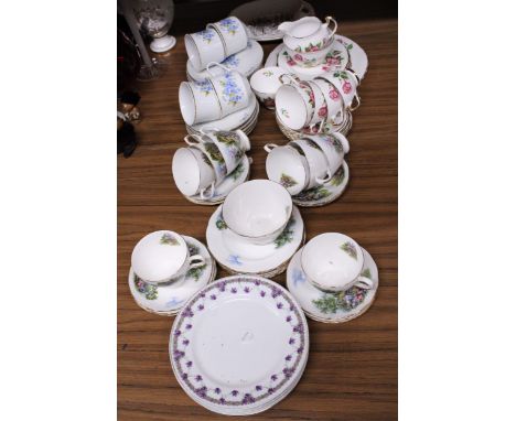 A QUANTITY OF CUP, SAUCERS AND PLATES TO INCLUDE ROYAL VALE COTTAGE SCENE TEASET, REGENT CHINA FLORAL TEASET, ETC.,