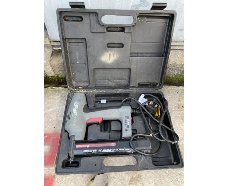 A RAPESCO ELECTRIC NAILER/STAPLER GUN