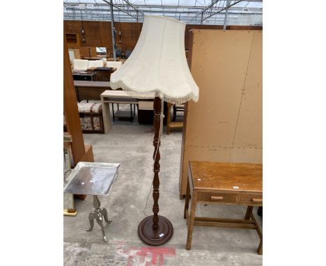A MID 20TH CENTURY STANDARD LAMP WITH SHADE