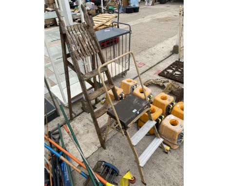 A BLACK AND DECKER HANDYJACK STEP LADDER AND A FURTHER WOODEN LADDER