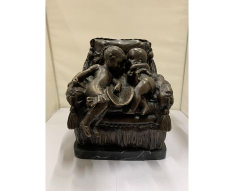 A BRONZE STUDY OF A BOY AND GIRL SITTING ON A CHAIR, ON A MARBLE BASE, HEIGHT 21CM, WIDTH 18CM