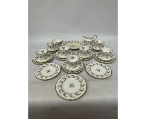 A ROYAL CROWN DERBY 'BLUE PIMPERNEL' TEASET TO INCLUDE A CAKE PLATE, CREAM JUG, SUGAR BOWL, CUPS, SAUCERS AND SIDE PLATES