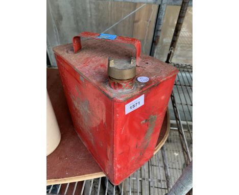 A VINTAGE METAL FUEL CAN WITH BRASS CAP