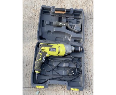 A RYOBI ELECTRIC DRILL WITH CARRY CASE