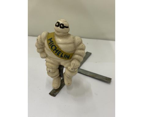 A VINTAGE MICHELIN MAN POSSIBLE CAR/RADIATOR MASCOT, HEIGHT ON METAL STAND, HEIGHT 15CM