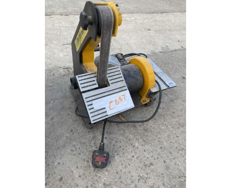 AN ELECTRIC PERFORM BELT SANDER