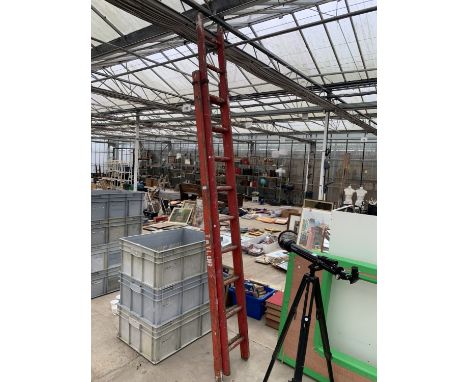 A TWENTY RUNG EXTENDABLE WOODEN LADDER
