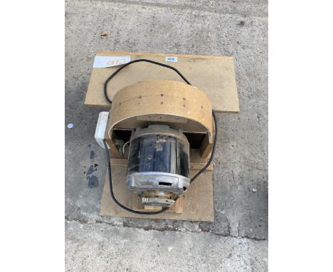 AN ELECTRIC BENCH TOP DISC SANDER