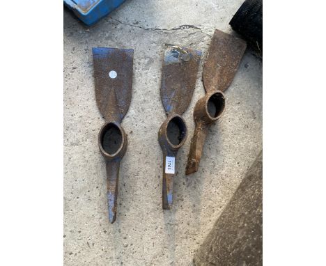 THREE PICK AXE HEADS
