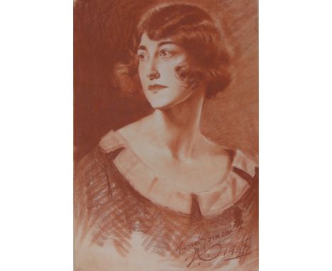 Sanguine chalk portrait of a woman, indistinctly signed, dated 1923, 22" x 14.5", framed.