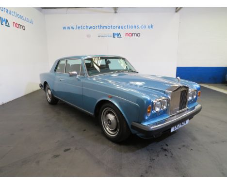 MULLINER PARK WARD CORNICHE FIXED HEAD COUPE IS FINISHED IN CARIBBEAN AQUA BLUE WITH CONTRASTING DARK NAVY LEATHER INTERIOR. 