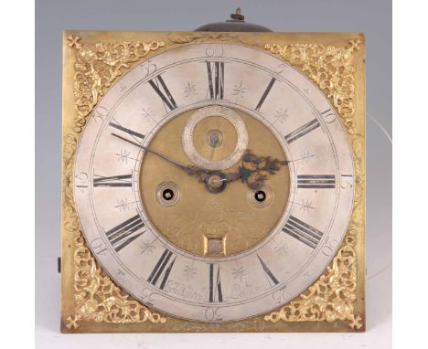 EDW. PATRICK LONDON AN EARLY 18TH CENTURY 12" BRASS EIGHT DAY LONGCASE CLOCK MOVEMENT with twin cherub and crown spandrels, e