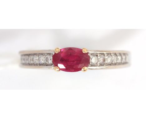 AN 18K WHITE GOLD RUBY AND DIAMOND RING app. 3.4g