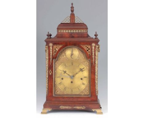 JOHN TAYLOR LONDON  A GEORGE III FIGURED MAHOGANY QUARTER CHIMING BRACKET CLOCK the bell top case with a glazed door and fish