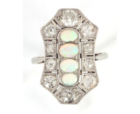 AN ART DECO PLATINUM OPAL AND DIAMOND SET RING with four opals surrounded by ten brilliant cut diamonds 25mm deep, app. 5.4g