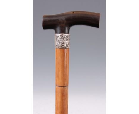 A LATE 19TH CENTURY MALACCA AND HORN HANDLED SWORD STICK with silver collar and shaped handle, having a four edge steel blade