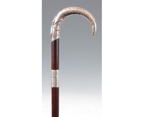 A GOOD LATE 19TH CENTURY FRENCH SWORD STICK MADE BY L. CHOBERT PARIS having a solid silver lotus-leaf handle with a Beetle mo