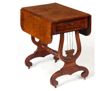 A GOOD GEORGE IV POLLARD OAK DROP LEAF SIDE TABLE with end drawer raised on a lyre shaped base  joined by a ring turned cross