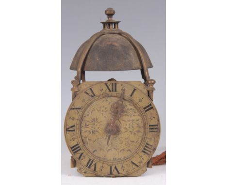 A PRIMITIVE 17TH CENTURY EARLY LANTERN CLOCK OF UNUSUAL DESIGN with floral engraved dial centre surrounded by a chapter ring 