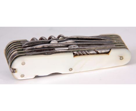 AN EARLY 20TH CENTURY MOTHER OF PEARL AND STEEL MULTI-TOOL PENKNIFE BY J.A. HENCKELS consisting of eight blades and 10 variou