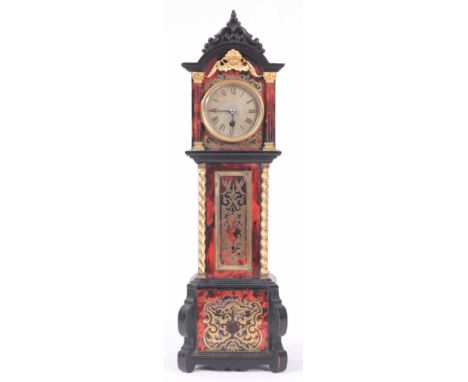 A LATE 19TH CENTURY FRENCH TORTOISESHELL AND BRASS INLAID MINIATURE LONGCASE CLOCK the case with boulle work panels to the fr