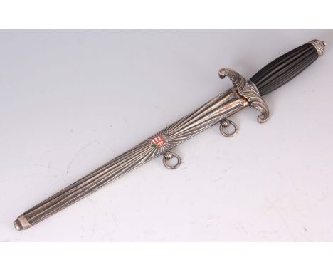 A WW2 HUNGARIAN ROYAL GUARD DAGGER the 24cm steel blade elaborately etched to one side with scrollwork designs and gold coat 