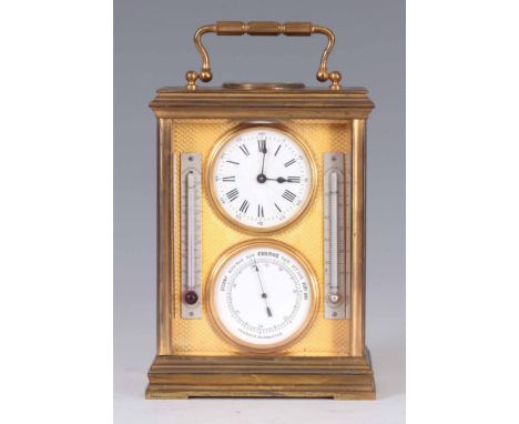 A LATE 19TH CENTURY FRENCH GILT BRASS DESK COMPENDIUM CARRIAGE CLOCK the moulded edged case inset  with a silvered compass un
