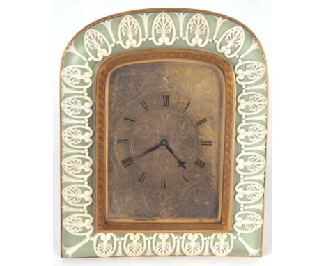 A MID 19TH CENTURY THOMAS COLE STYLE STRUT CLOCK the green Wedgwood jasperware surround with gilt engraved bezel enclosing a 