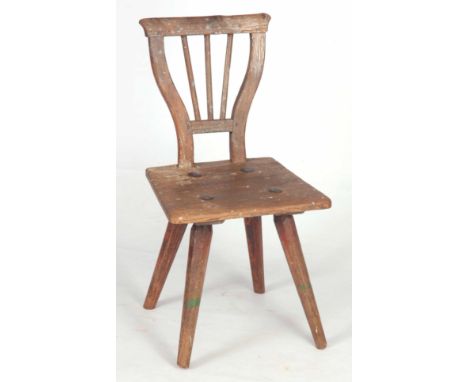 AN EARLY 18TH CENTURY SCOTTISH STRIPPED PINE SIDE CHAIR with a shaped comb back, square seat and tapering chamfered leg suppo