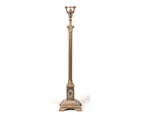 A GOOD 20TH CENTURY BRASS CORINTHIAN COLUMN STANDARD LAMP with adjustable stem and large stepped base 160cm high.
