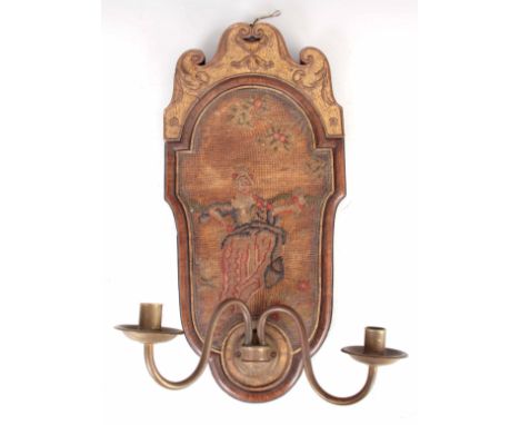 A QUEEN ANNE HANGING WALL SCONCE with shaped cross-grained walnut and carved gilt surround, tapestry panel depicting a young 