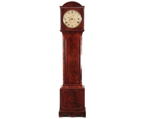 KAISER &amp; KLEYSER  BROAD STREET  BLOOMSBURY   A REGENCY FIGURED MAHOGANY LONGCASE CLOCK the hood having a break arch pedim