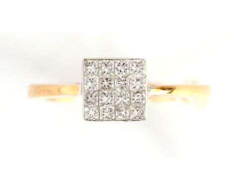 AN 18K YELLOW GOLD DIAMOND RING having sixteen brilliant cut diamonds set in white gold to form of a square on 18K yellow gol