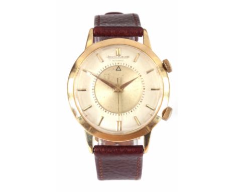 A GENTLEMAN'S 18K GOLD JAEGER-LECOULTRE MOMOVAX WRIST WATCH WITH ALARM on brown leather strap, the circular case enclosing a 