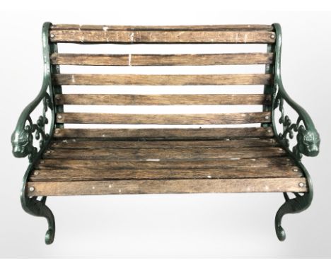A teak and cast iron garden bench, width 100 cm 