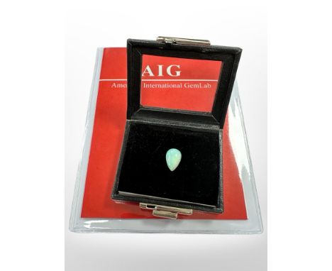 A natural white opal, with play of colour, cabochon cut, 16.12mm x 10.78mm x 4.63mm, weight 3.62 ct, with AIG certificate.
