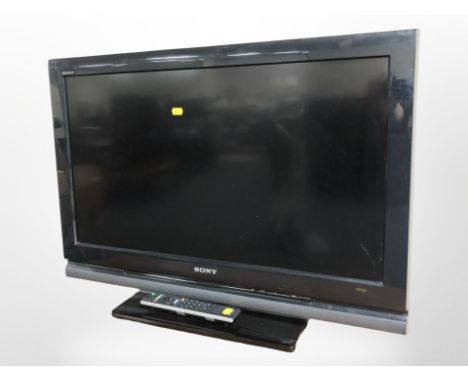 A Sony Bravia 32 inc lcd tv with lead and remote 