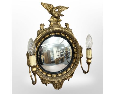 A reproduction gilt girandole mirror with twin lamp sconces, height 65 cm